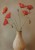 wytwory_plakaty_Czerwone_maki_w_ceramicznym_wazonie_sciana_1.jpg